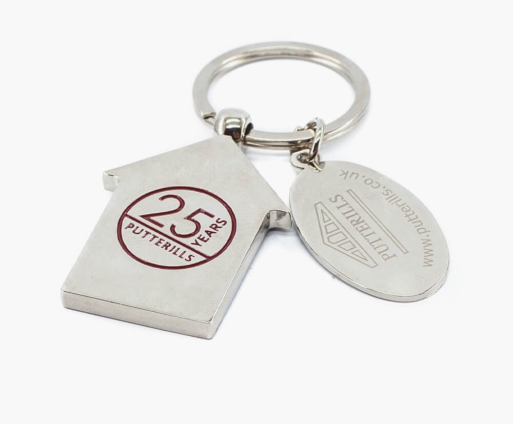 House shaped keyrings with 1 colour fill on front (+ engraved charm)