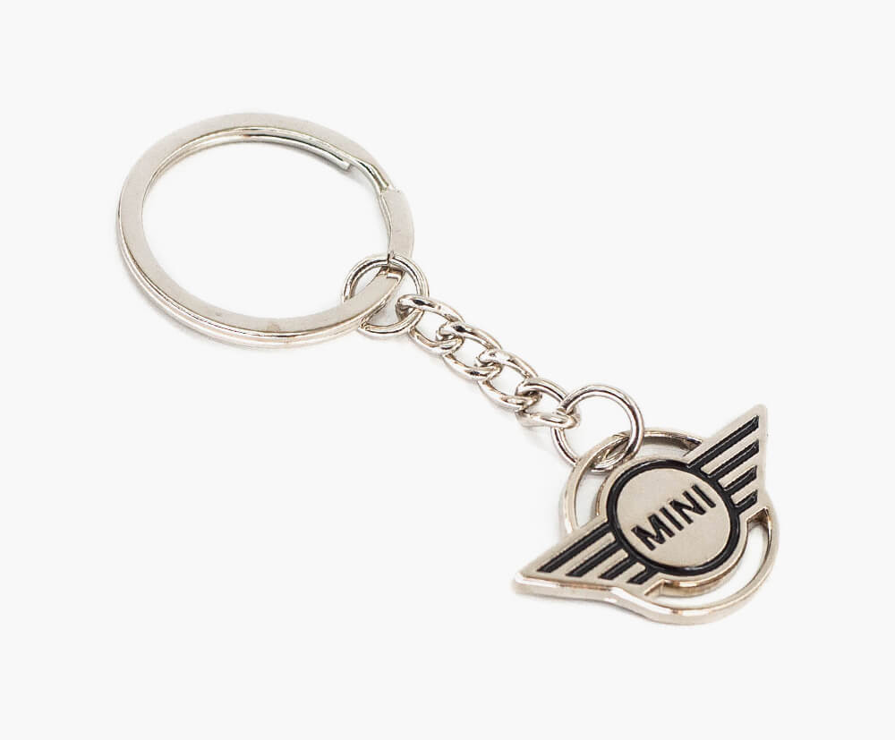 Mini keyring that fits within the 35mm x 35mm x 1mm thickness price band.