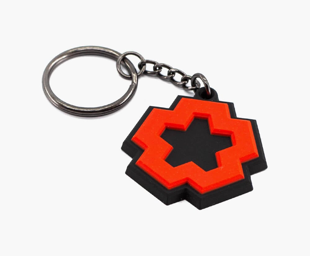 3D moulded PVC keyrings with bevelled edges. 2 colour PVC fill with black chain attachment.