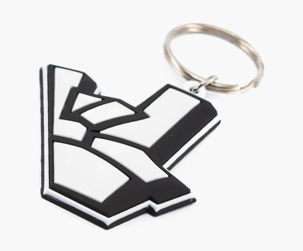 Black & white PVC keychains with 3D rounded design on front side (2D on backside).