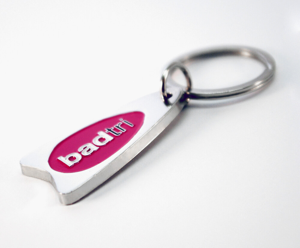 A solid, 3mm thick metal keyring with 3 colour enamel fill.
