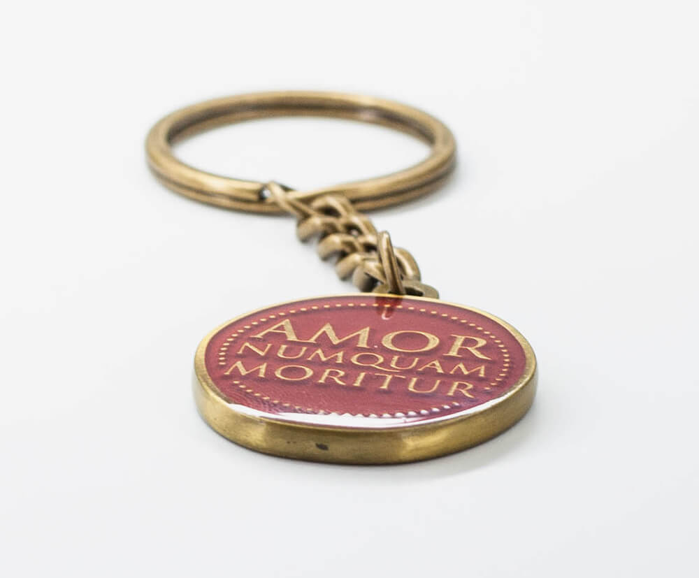 4mm thick antique gold keyrings with 1 colour enamel fill.
