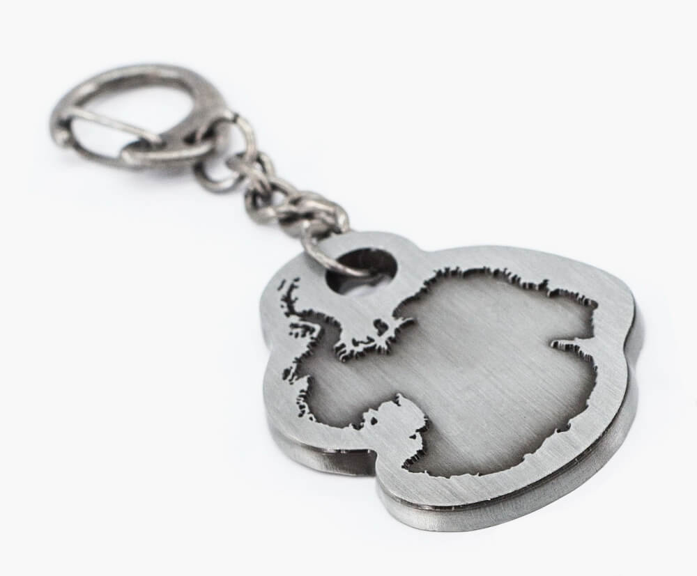 Custom moulded 3mm thick antique silver keyring.