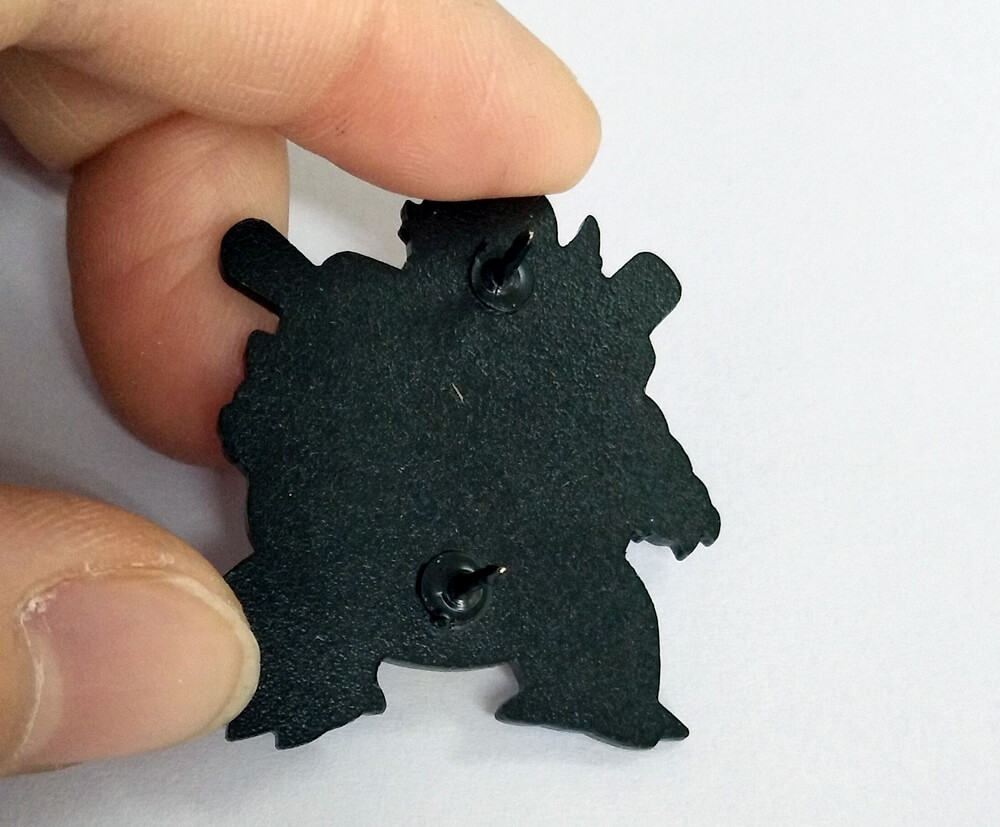 Black dyed metal plating on reverse of keyring.