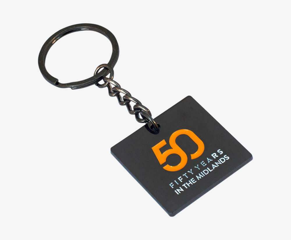 Quality square, metal black plated keyfobs with custom 2 colour enamel branding on the front.