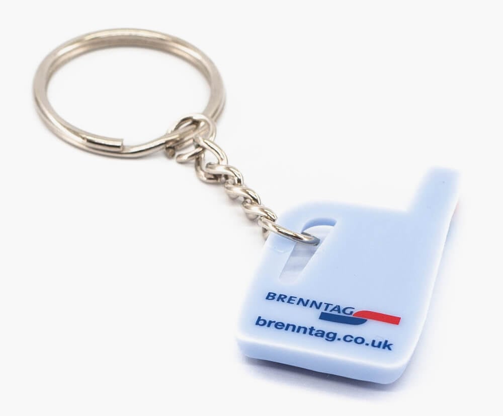 2 colour printed onto the reverse of a 2D pvc keyring. Frontside is 3D moulded.