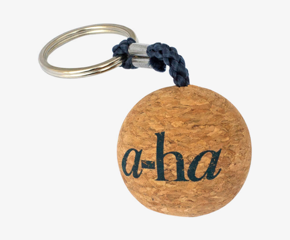 Cork keyring, with branding printed in matching colour with cord attachment.