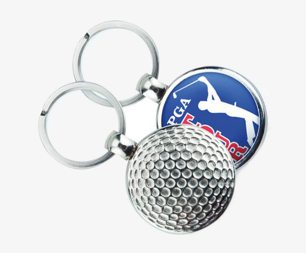 Custom promotional keyring with a golf ball design.