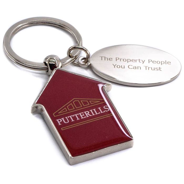 Custom promotional keyring with printed house-shape and additional engraved disc.