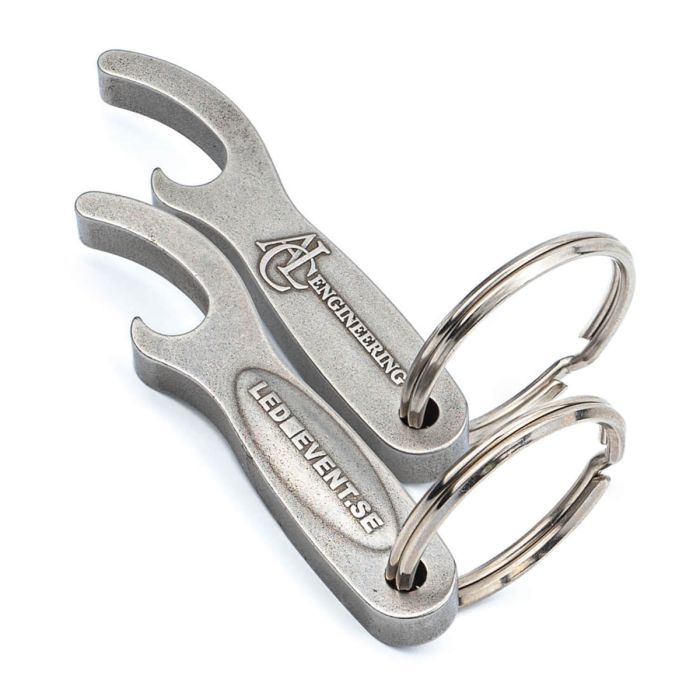 Recycled bottle opener keyrings from car alloy. Branded with your design.
