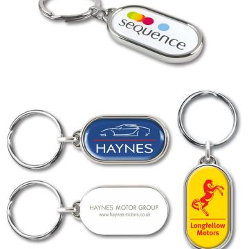 Domed acrylic keyrings with full-colour printed custom logos and split-ring fittings, shown in oval and rounded rectangle shapes.