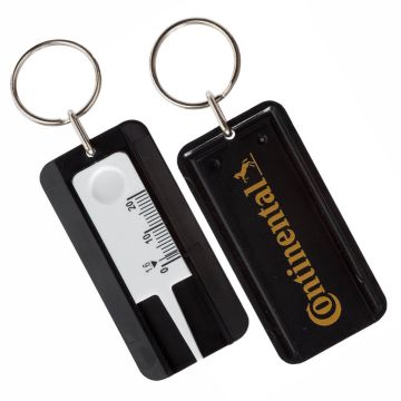 Black tyre gauge promotional keyring.