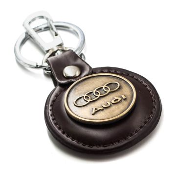 PU leather keyring with branded medallion.
