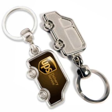 Metal van shaped keyring. Printed on front and embossed details on back.