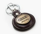 PU leather keyring with branded medallion.