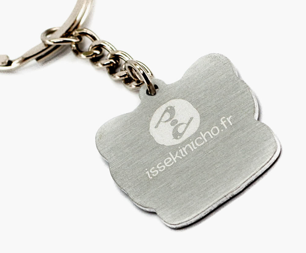 Personalised metal keyring with an engraved design on the reverse.