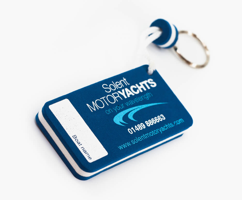 A 9mm thick floating keyring with 2 colour print. Designed within a 100x100mm area.