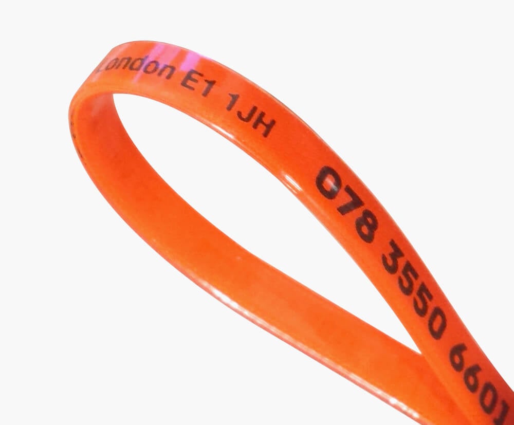 Fluorescent orange ribbon option for ad-loop keyrings