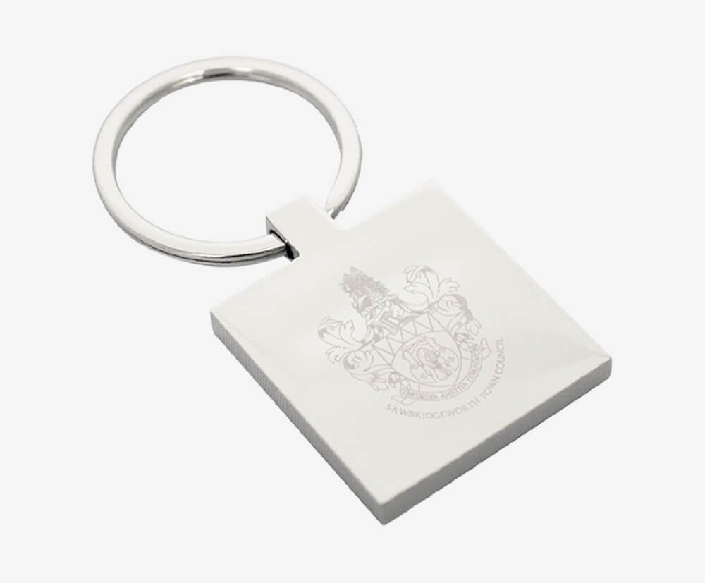 Square promotional keyring with custom engraved branding.