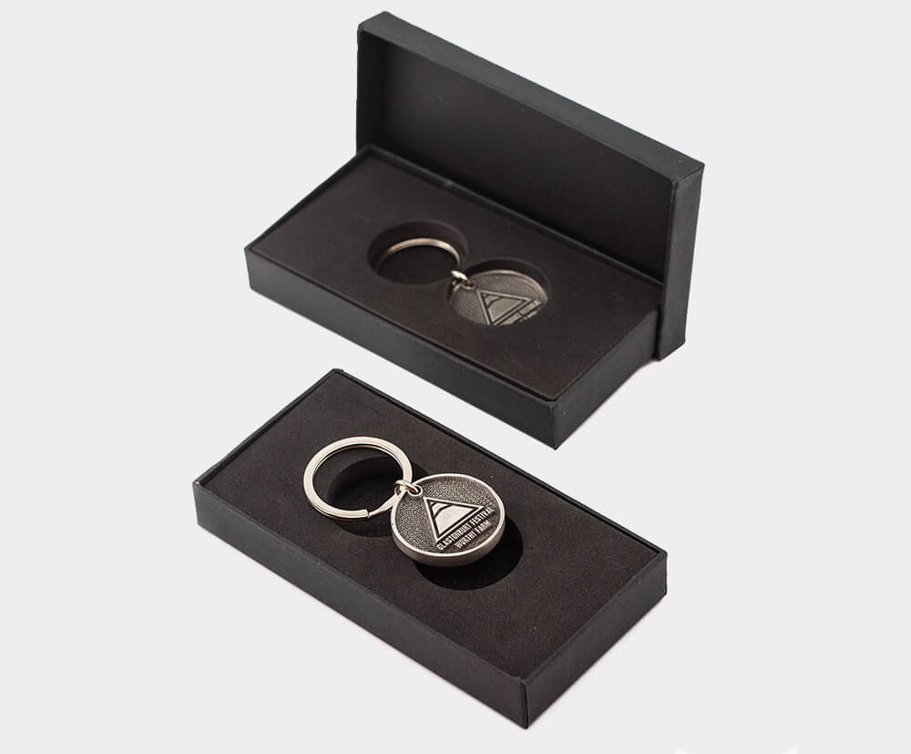 Deluxe keyring with presentation box made from high-quality paper with foam inserts.