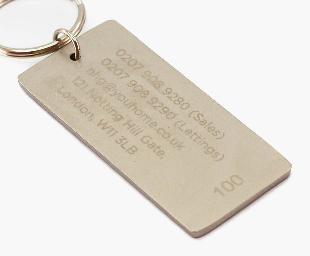 Sequentially numbered engraving anywhere on the keyring design as shown in this example.
