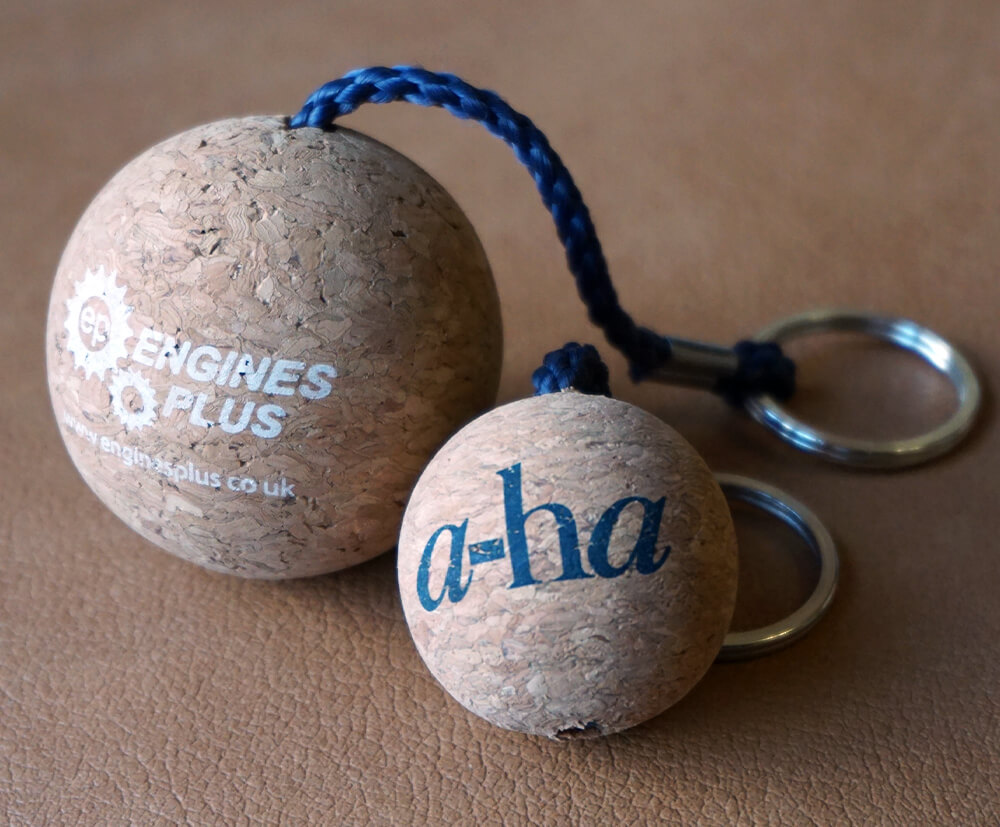 The 2 sizes of our promotional cork keyrings, with custom colours for cord and printing.