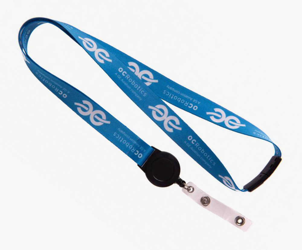 Lanyard with badge reel connector attachment.