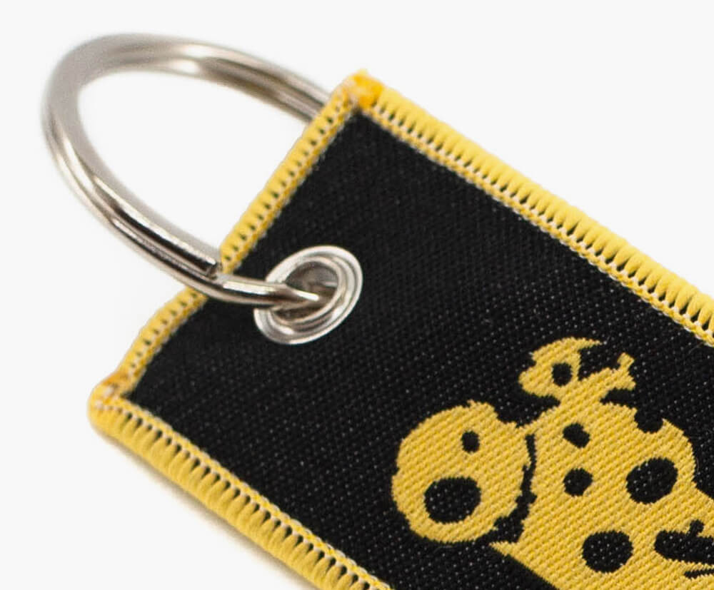 attachment style for woven and embroidered keyring tags