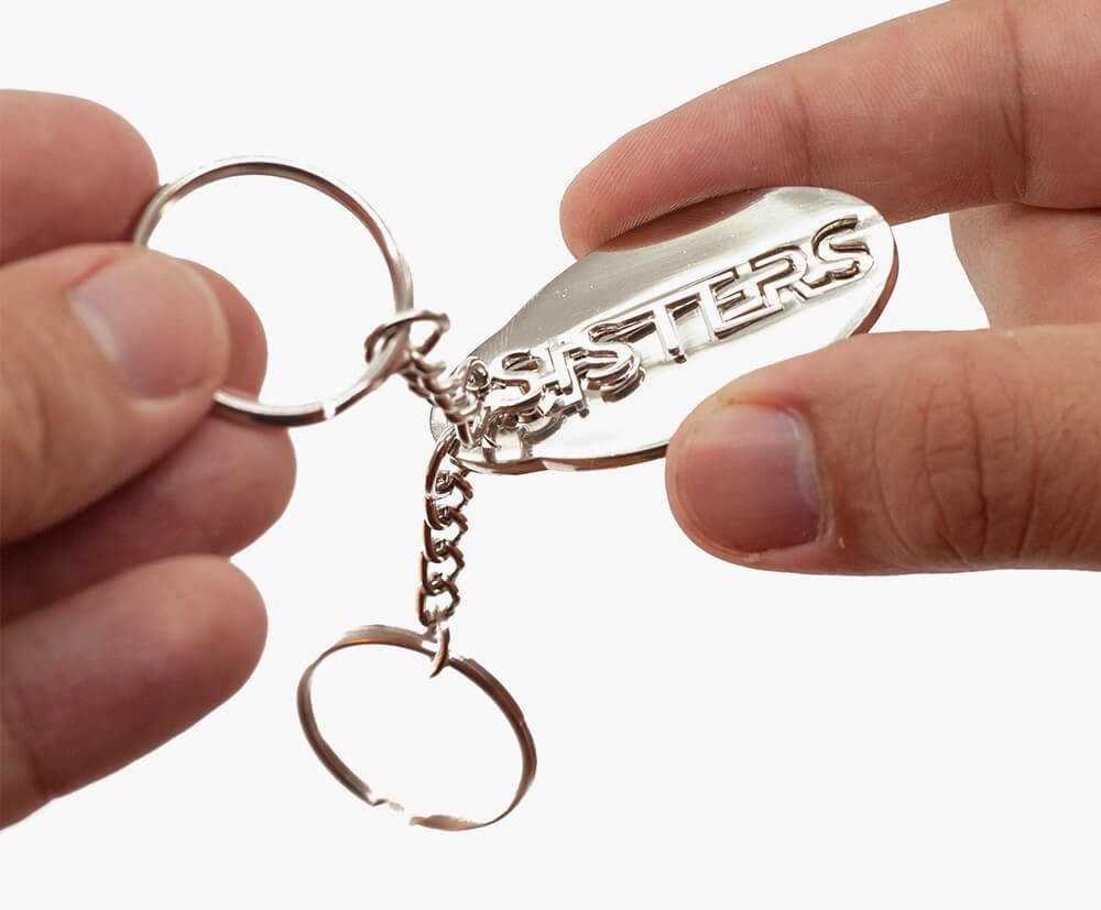 2mm thick keyrings that fit within the 65x65mm design area limit.