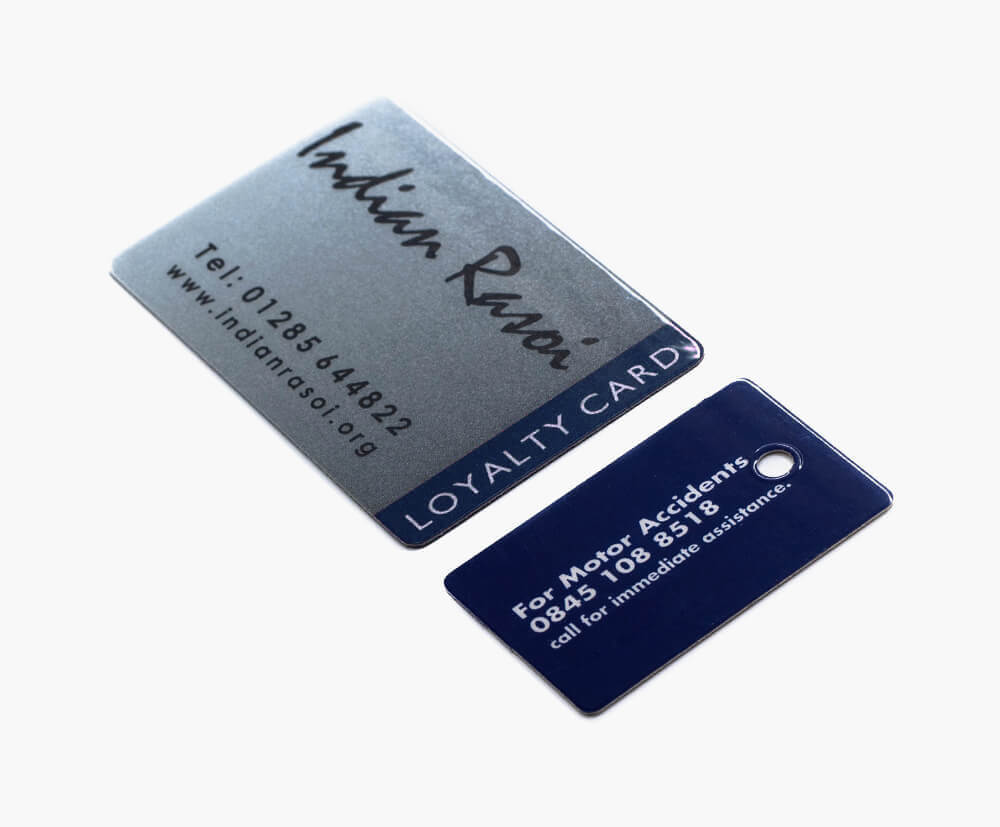 Plastic business card with a snap-off keyfob.