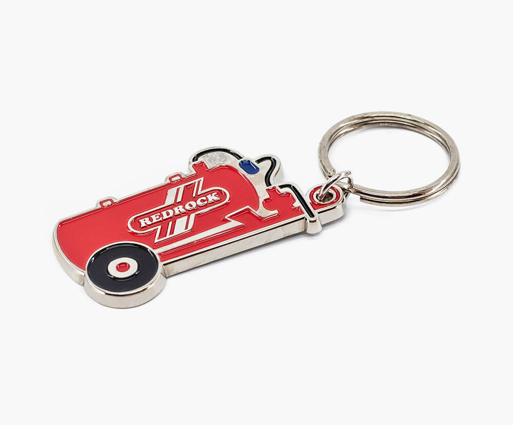 Tractor shaped custom keyring in 3 colour fills.