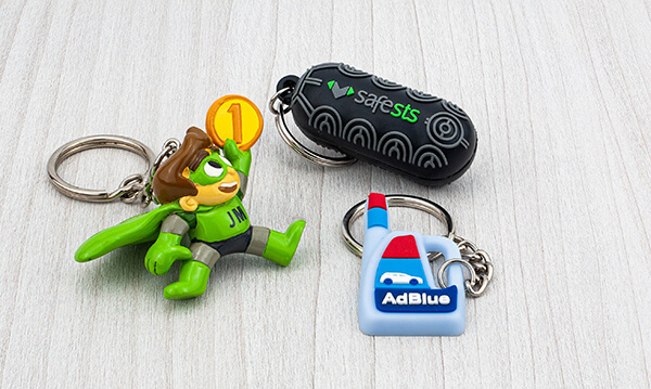 Group of custom folded 3d cubic character & product replica keyfobs