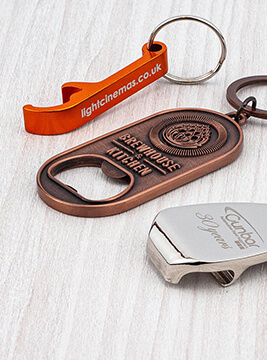 A group of custom moulded bottle opener keyrings