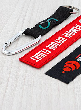 Group of fabric keyrings customised with company logos