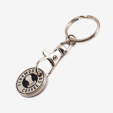 Customised trolley coin keyrings printed with a coffee company logo.