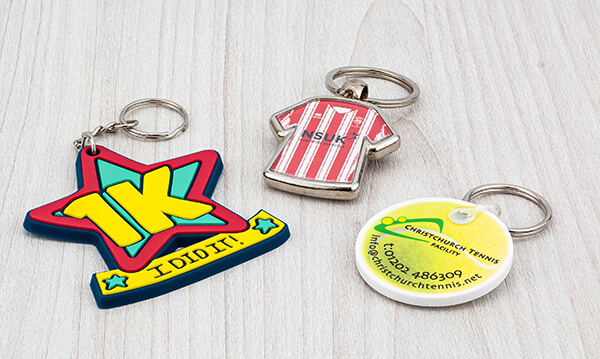 Examples of sport themed keyrings printed with branding and logos.